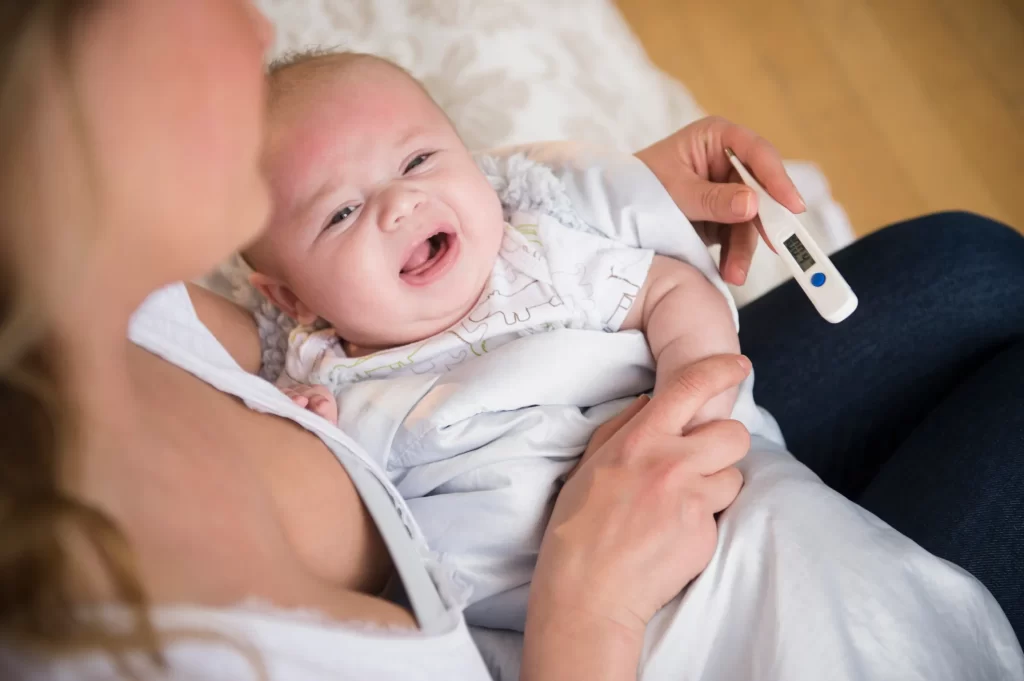 How to dress baby with fever at night